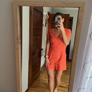 Trina Turk Romper, melon colored lace. Back zip